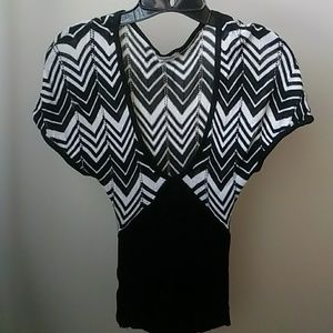 Black and White deep v-neck light sweater.